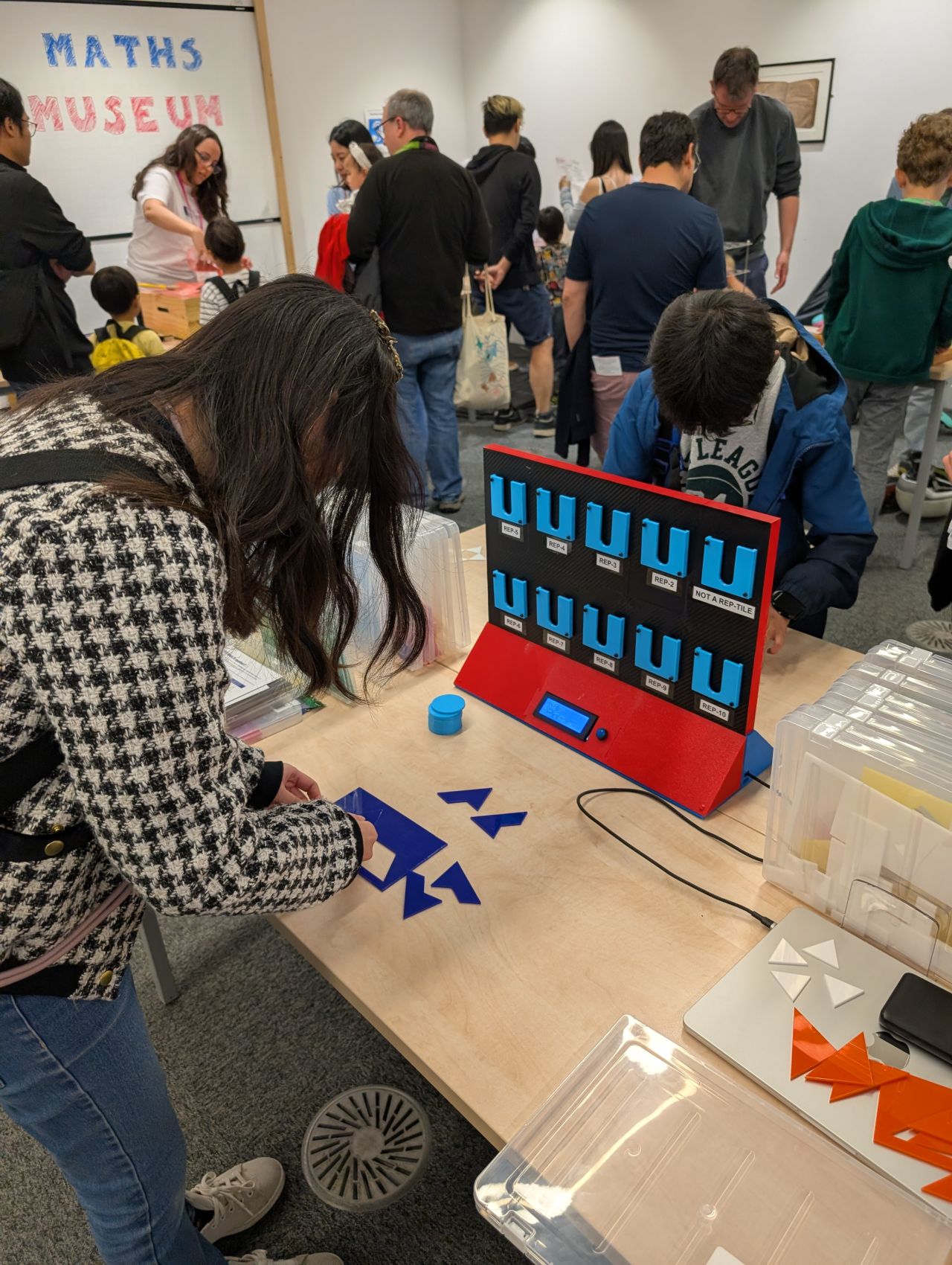 Players interacting with Rep-Tile